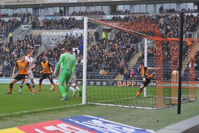 Milton Keynes Dons midfielder Antony Kay(6) scores to go 1-0 up during the Sky Bet Championship match between Hull City and Milton Keynes Dons at the KC Stadium, Kingston upon Hull, England on 12 March 2016. Photo by Ian Lyall. PNL-161203-164459002