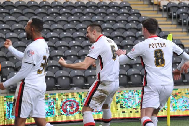 Milton Keynes Dons midfielder Antony Kay(6) celebrates scoring goal to go 1-0 up during the Sky Bet Championship match between Hull City and Milton Keynes Dons at the KC Stadium, Kingston upon Hull, England on 12 March 2016. Photo by Ian Lyall. PNL-161203-170937002