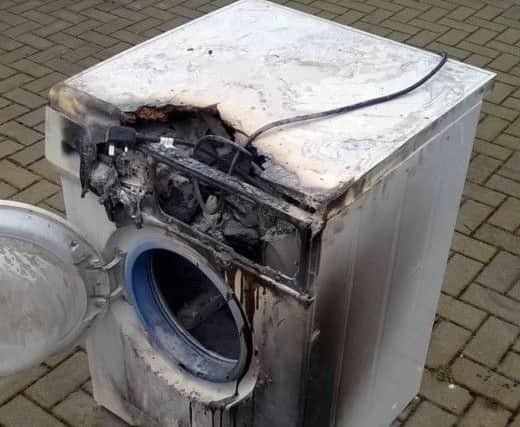 Flames engulfed the washing machine pictured above