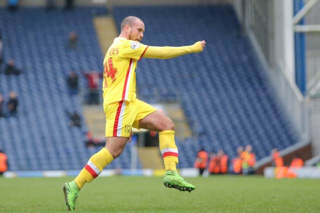 MK Dons midfielder Samir Carruthers (14) scores for MK Dons during the Sky Bet Championship match between Blackburn Rovers and Milton Keynes Dons at Ewood Park, Blackburn, England on 27 February 2016. Photo by Simon Davies.