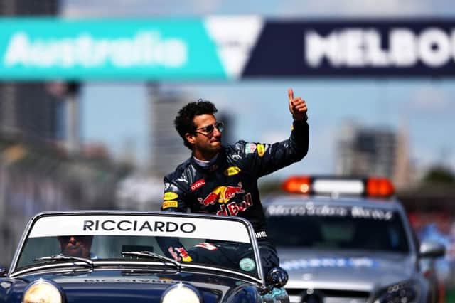 MELBOURNE, AUSTRALIA - MARCH 20:  Daniel Ricciardo of Australia and Red Bull Racing on the Drivers Parade ahead of the Australian Formula One Grand Prix at Albert Park on March 20, 2016 in Melbourne, Australia.  (Photo by Clive Mason/Getty Images) // Getty Images / Red Bull Content Pool  // P-20160320-00109 // Usage for editorial use only // Please go to www.redbullcontentpool.com for further information. // PNL-160320-073206002
