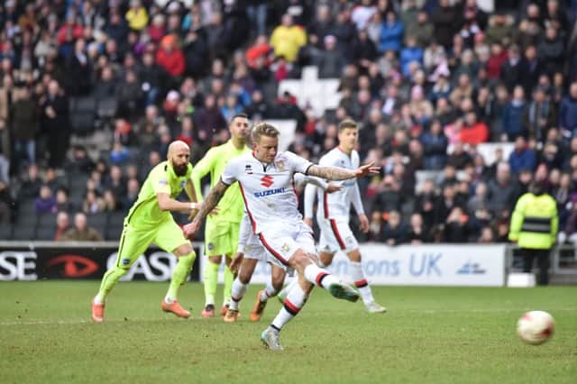 Carl Baker is the latest player to miss a spot kick for MK Dons