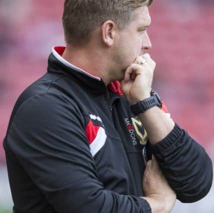 Karl Robinson (Manager) showing the strain during the Sky Bet Championship match between Middlesbrough and Milton Keynes Dons at the Riverside Stadium, Middlesbrough, England on 12 September 2015. Photo by George Ledger. PSI-0876-0015
