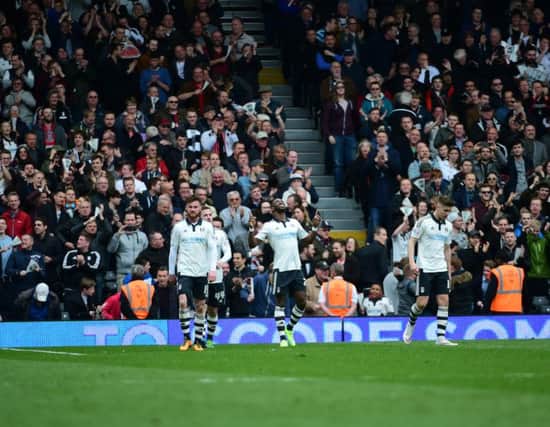 Fulham Forward Moussa Dembele (25) celebrates Fulham's second goal during the Sky Bet Championship match between Fulham and Milton Keynes Dons at Craven Cottage, London, England on 2 April 2016. Photo by Jon Bromley. PNL-160204-164816002