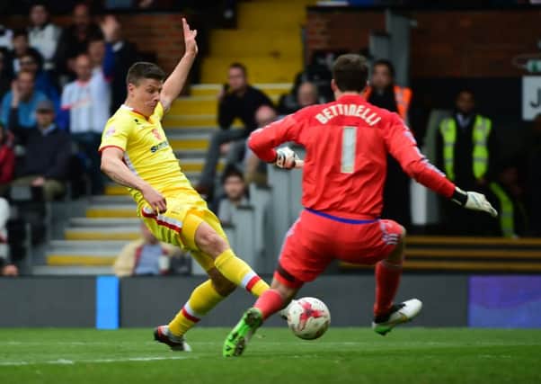 MK Dons Alex Revell takes a shot at goal during the Sky Bet Championship match between Fulham and Milton Keynes Dons at Craven Cottage, London, England on 2 April 2016. Photo by Jon Bromley. PNL-160204-173825002