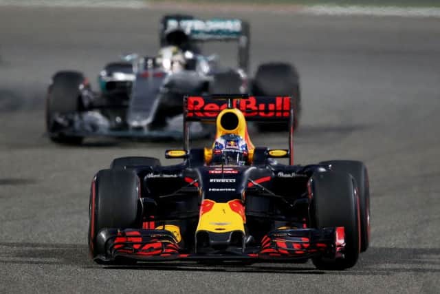 Daniel Ricciardo heads Lewis Hamilton in the early stages in Bahrain