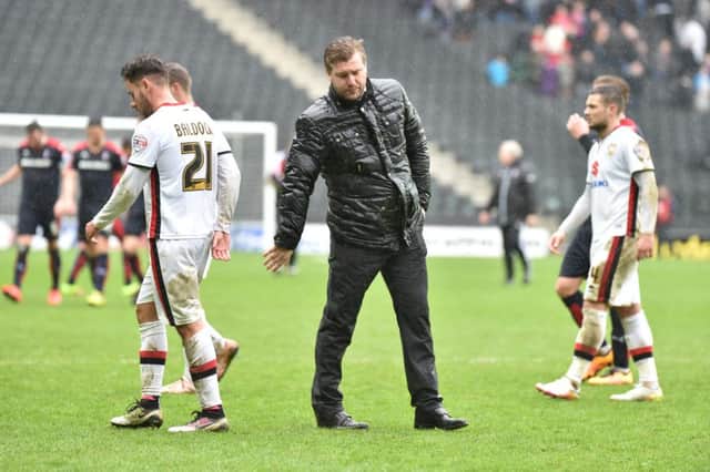 Karl Robinson after the defeat to Rotherham PNL-160904-215226002