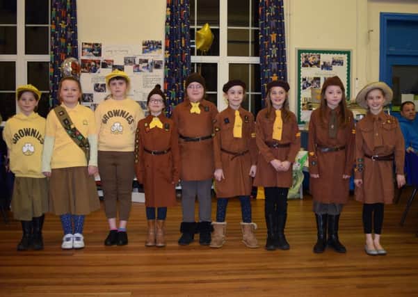 1st Fenny Stratford Brownies wearing old uniforms on their 90th anniversary