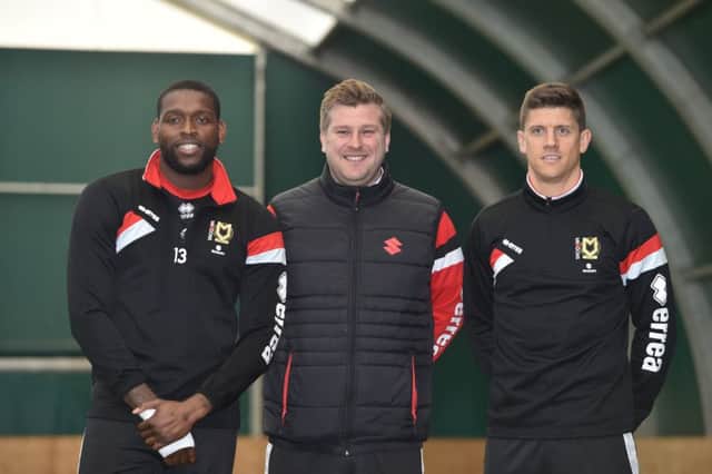 Karl Robinson with deadline day signings Jay Emmanuel-Thomas and Alex REvell