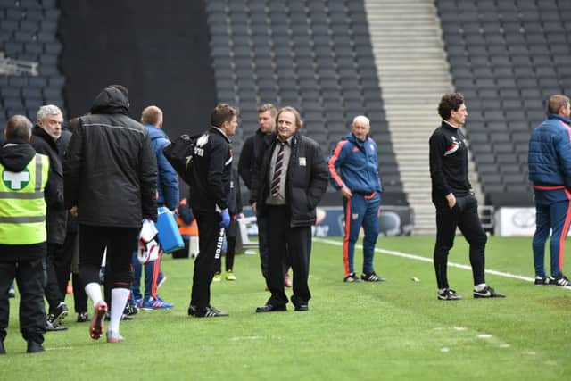 Dons chairman Pete Winkelman and the MK Dons players after relegation