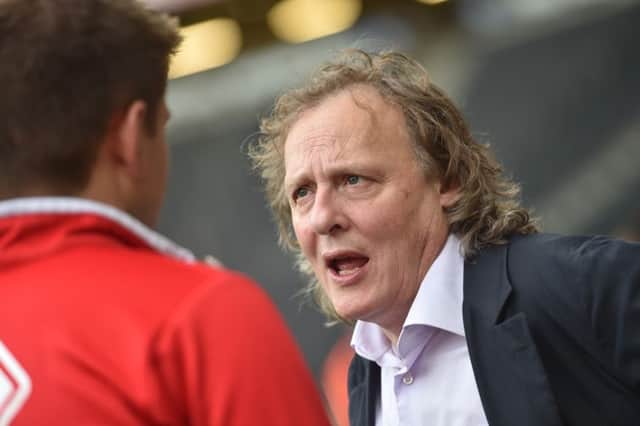 A dejected Pete Winkleman after Dons relegation