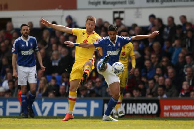 MK Dons forward Dean Bowditch (9) challenges Ipswich Town midfielder Kevin Bru (17) during the Sky Bet Championship match between Ipswich Town and Milton Keynes Dons at Portman Road, Ipswich, England on 30 April 2016. Photo by Simon Davies. PNL-160430-205007002
