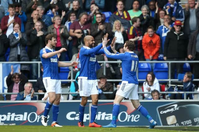Ipswich Town striker Brett Pitman (11) scores a goal and celebrates to make the score 2-1 during the Sky Bet Championship match between Ipswich Town and Milton Keynes Dons at Portman Road, Ipswich, England on 30 April 2016. Photo by Simon Davies. PSI-1954-0045