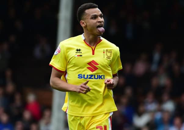 MK Dons forward Josh Murphy celebrates his goal during the Sky Bet Championship match between Fulham and Milton Keynes Dons at Craven Cottage, London, England on 2 April 2016. Photo by Jon Bromley. PSI-1784-0023