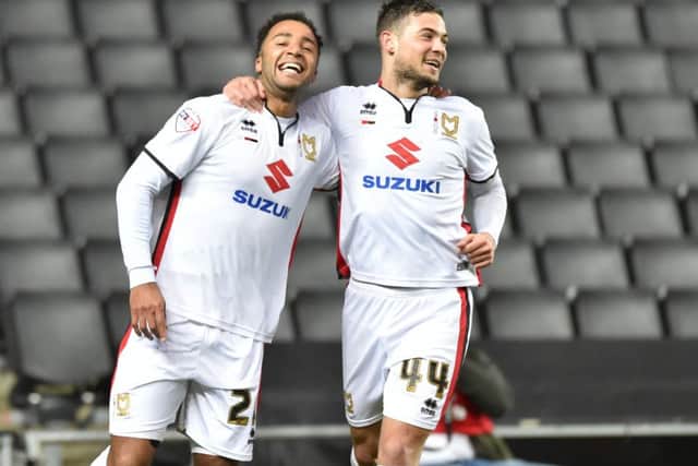 Nicky Maynard (left) is Dons' top scorer with Murphy this season.