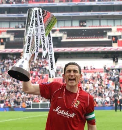 Captain Keith Andrews scored a penalty in the Johnstone's Paint Trophy final at Wembley in 2008 as Dons did the double.