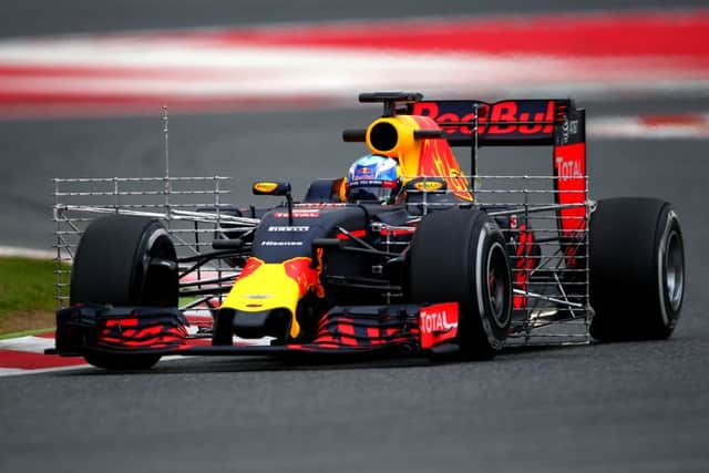 Daniel Ricciardo with sensors attached to his RB12 during testing in Spain
