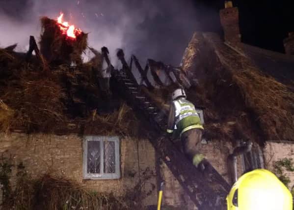Fire crews tackle a blaze at a thatched property in Great Haseley