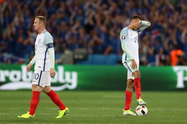 Wayne Rooney and Dele Alli look dejected after the Iceland game