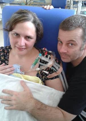 Leigh and  Martin Kendall with baby Hugo