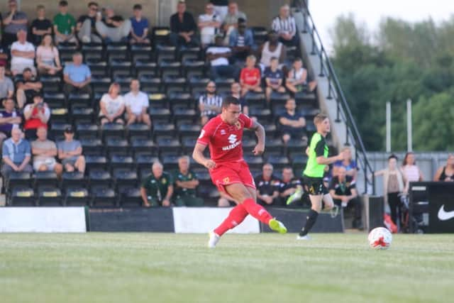 Samir Carruthers in action against Corby. PNL-160719-210730002