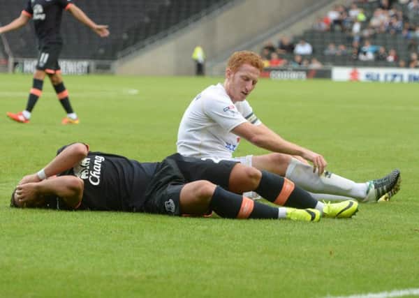 Dean Lewington in action against Everton. Pic: Jane Russell