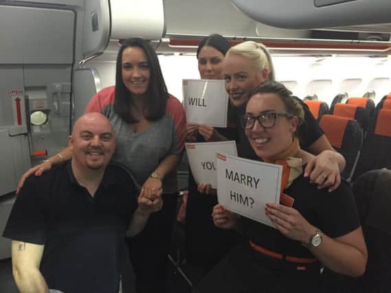 Matthew Hedges pops the question to his girlfriend of 2 years, Zosia Katnik mid-way through their easyJet flight from Luton to Majorca with the help of the cabin crew