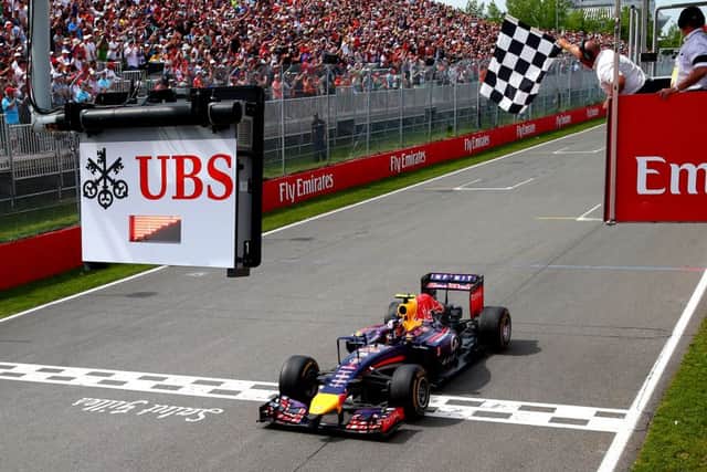 Ricciardo takes the chequered flag in Canada - his first win