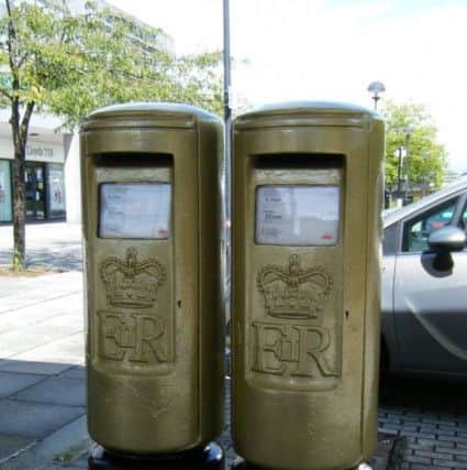 Greg Rutherford's gold postboxes