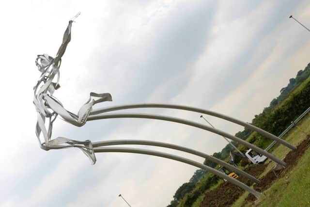 Greg Rutherford's statue on the A421