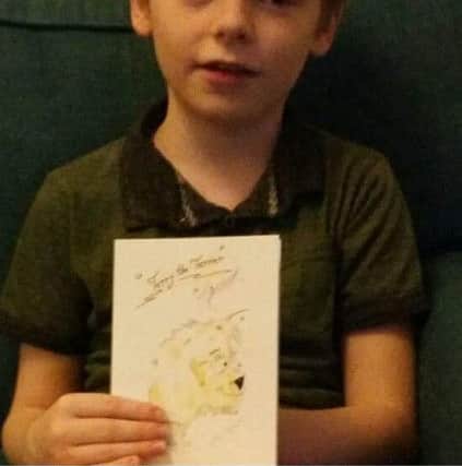 Ben with his letter from Charles Bronson