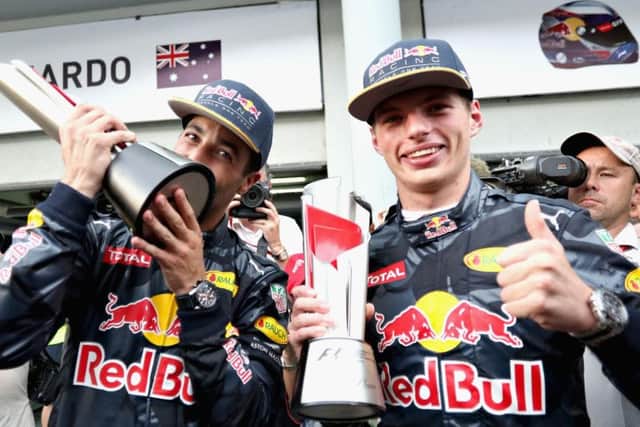 Daniel Ricciardo and Max Verstappen with their Malaysian Grand Prix trophies