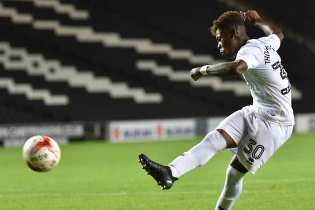 Thomas-Asante scored the winning penalty against Barnet