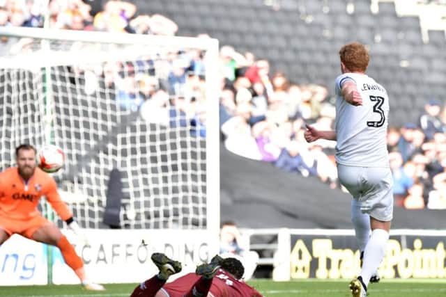 Dean Lewington had hit the post minutes before giving away a penalty