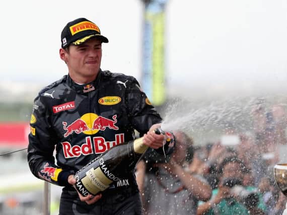 Max Verstappen on the podium in Japan