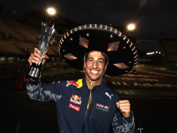 Daniel Ricciardo celebrates his third place late in the day in Mexico