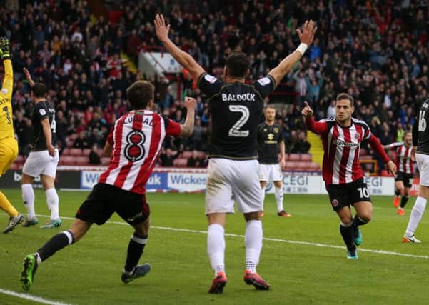 Billy Sharp celebrates scoring the winner against MK Dons