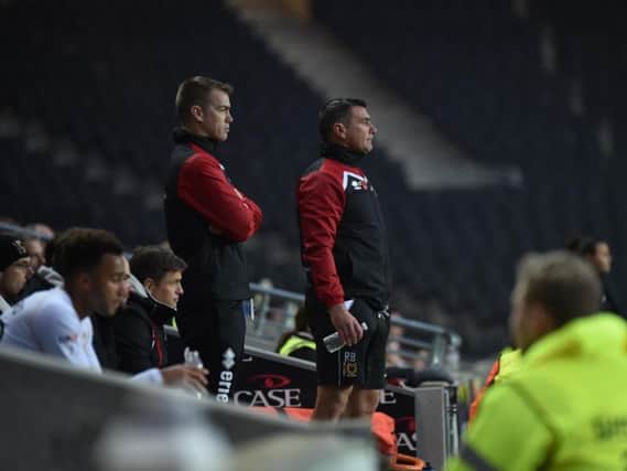 Richie Barker will remain in the dugout for MK Dons on Saturday