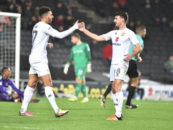 Daniel Powell celebrates scoring the opener