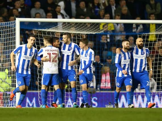 Championship leaders Brighton stand in the way of MK Dons and the FA Cup fourth round.