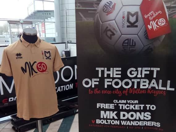 MK Dons' special MK50 kit alongside the offer of free tickets