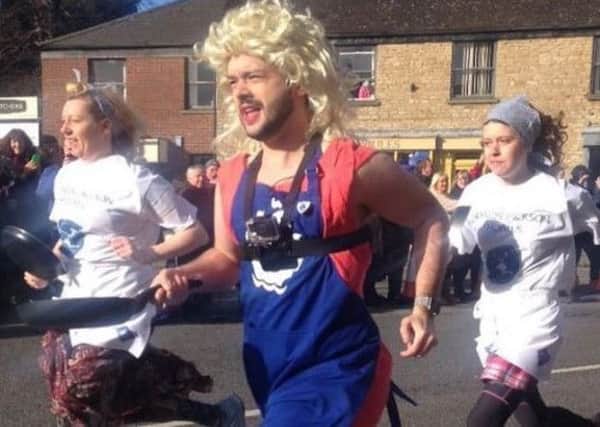 Blue Peter presenter Barney Harwood takes part in Olney's Pancake Day race 2015