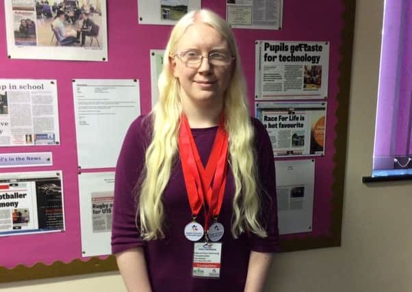 St Paul's Catholic School Student Katherine Healey with her medals