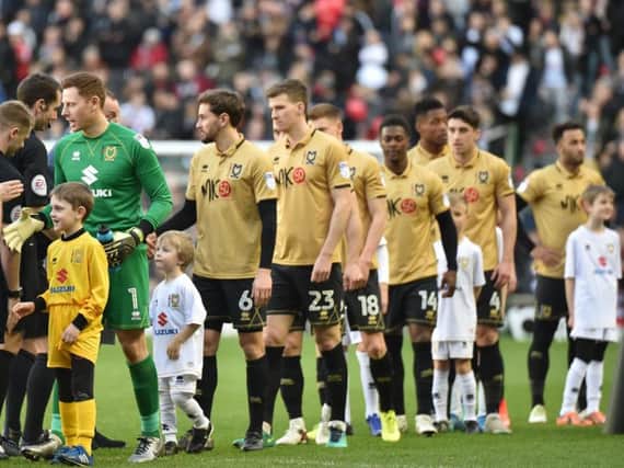 MK Dons wore a special gold kit for the game