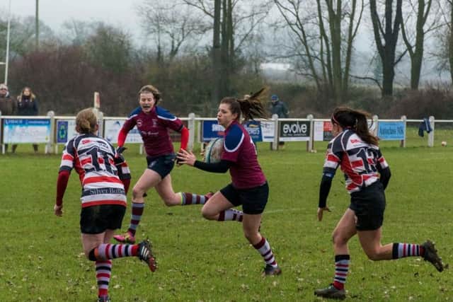 Georgia Green runs in a try for Bletchley Ladies