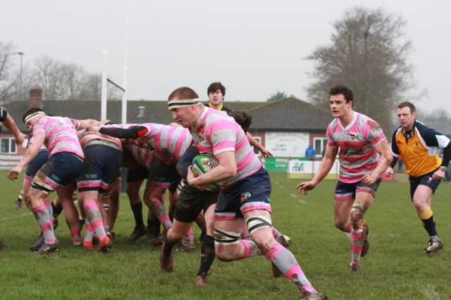 Man of the match Ollie Francis on the charge for Olney. Pic: Ricky Anderson