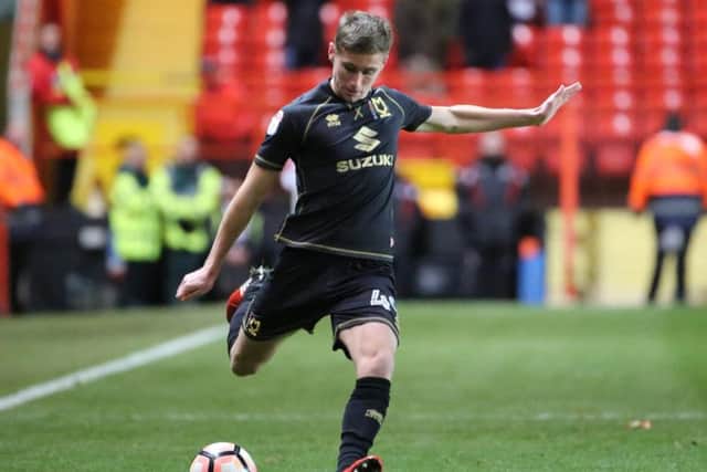 Wigan loanee Ryan Colclough scored a hat-trick in Dons' 4-1 win last time the sides met.