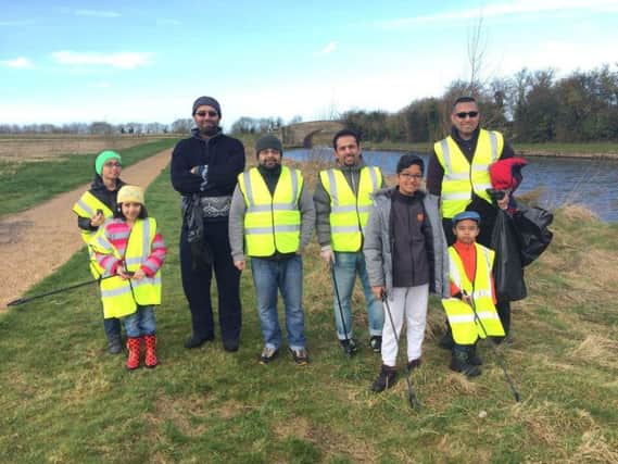 Making a difference: Members of the AMYA during the clean-up