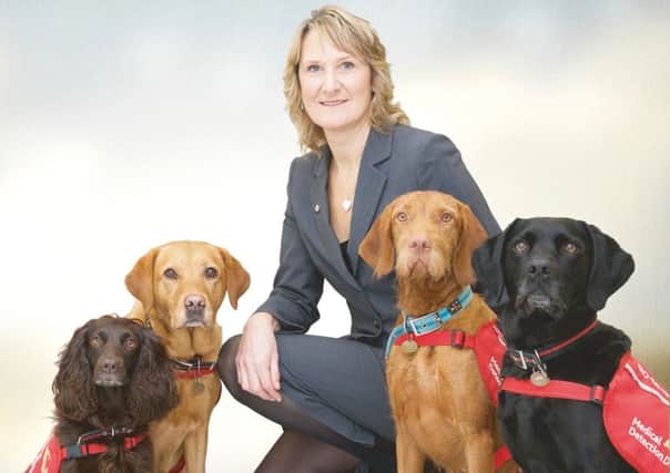 CEO of Medical Detection Dogs, Dr Claire Guest
