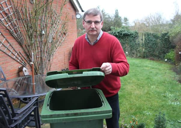 MPMC Councillor Douglas McCall with green bin